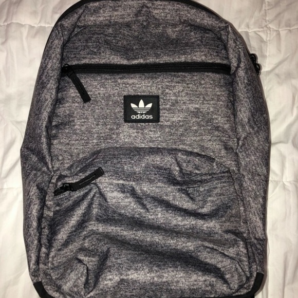 gray and black adidas backpack